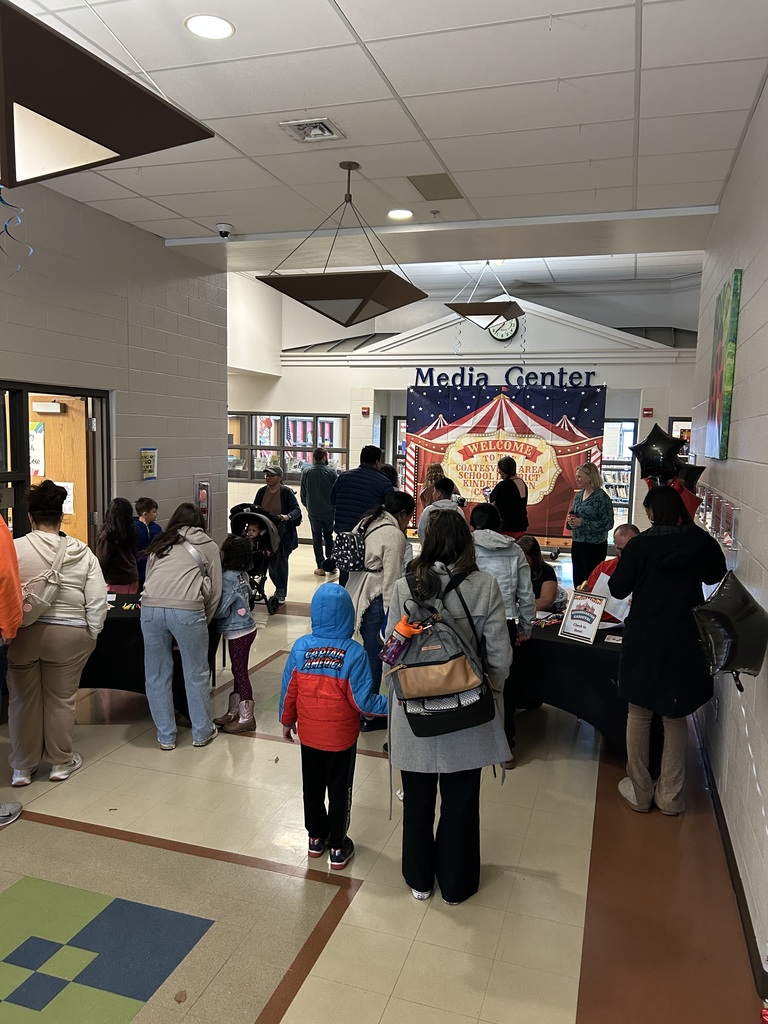 People registering for the Kindergarten Carnival