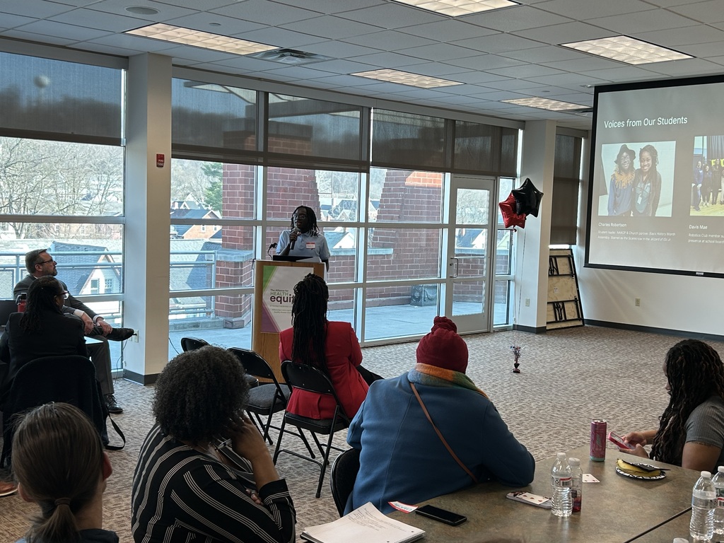 Student #1 addresses the Community Connections group