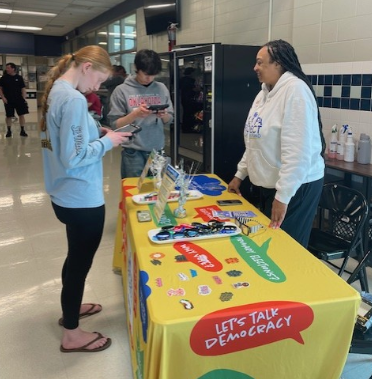 Picture of CASH students registering to vote #2