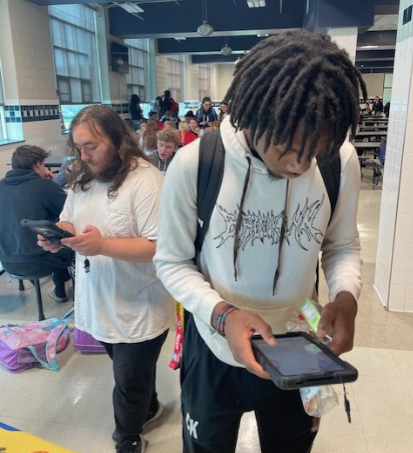 Picture of CASH students registering to vote #6