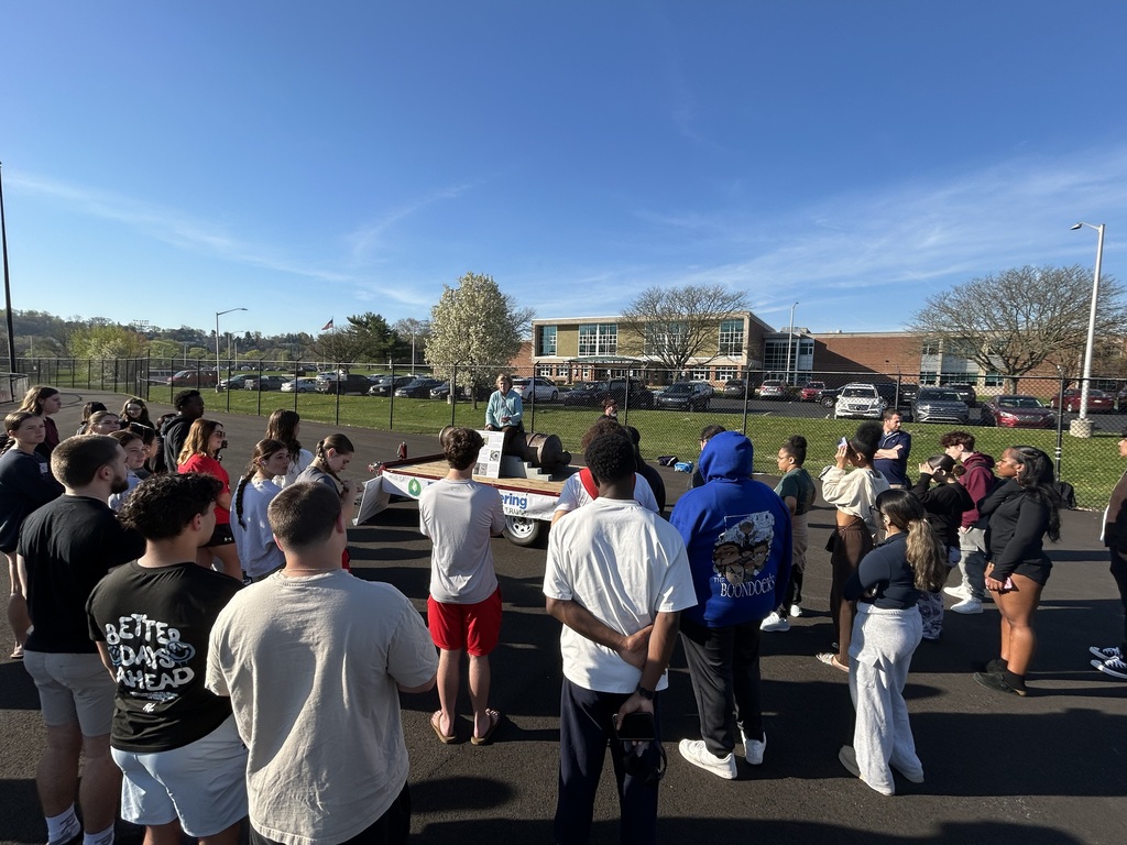 Students gathered to listen to a presentation about the Warwick Furnace Cannon.