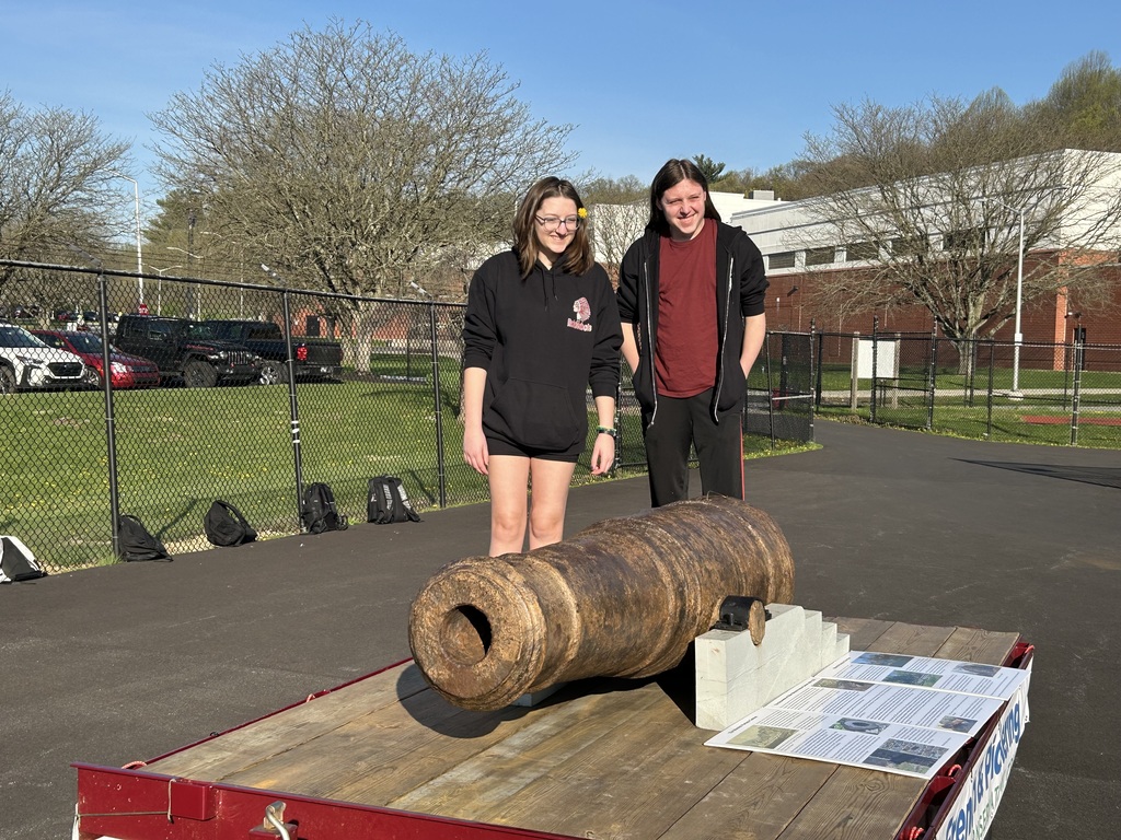 Students getting the opportunity to examine the Warwick Furnace Cannon #2.