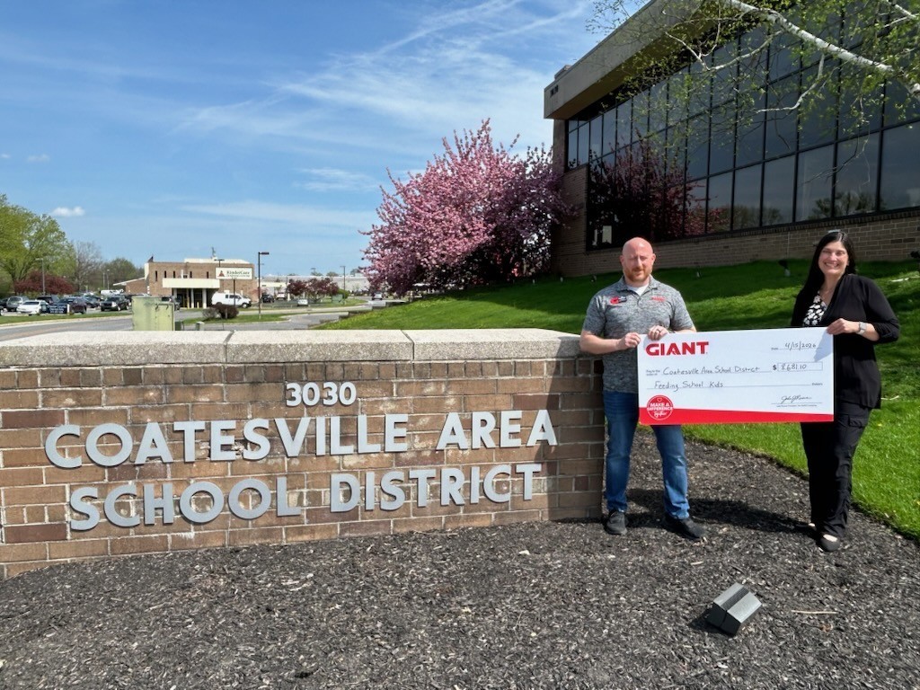  Erin Robinson, CASD Food Services Supervisor, meeting with Joe Buczkowski from Giant to receive a check from this incredible program.