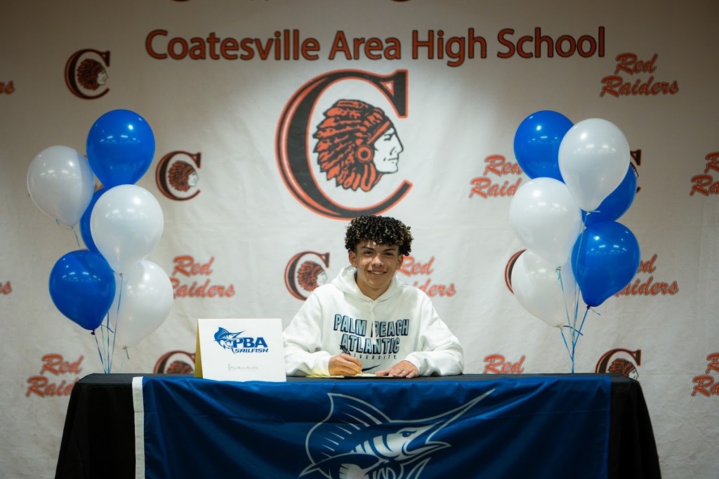 Picture of Andrew Winianas signing.