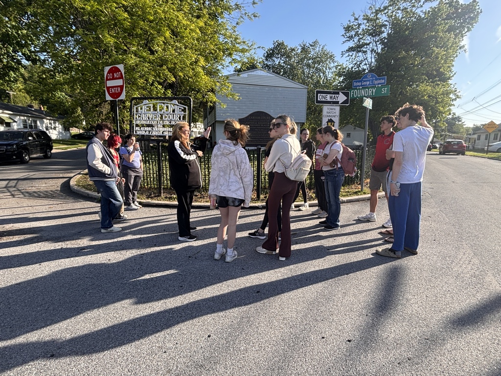 Students from Historic Research and Preservation classes on a walking tour of Coatesville picture #1.