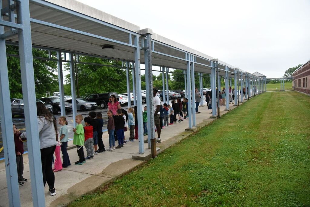 Students getting off of the fire truck at Reeceville Elementary #2