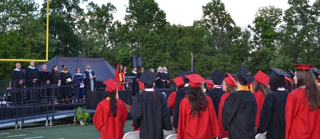 Graduates awaiting the ceremonies to end #2