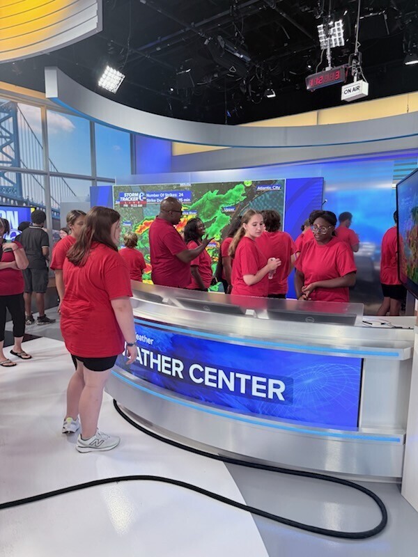Red Raider Marching Band exploring the set of 6ABC.