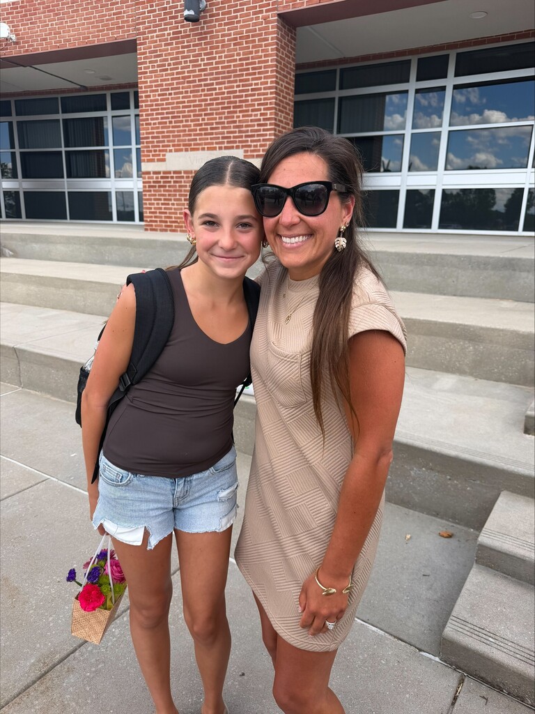 Summer Snapshots 2026 -- Arianna and Mrs. Miller outside dance recital