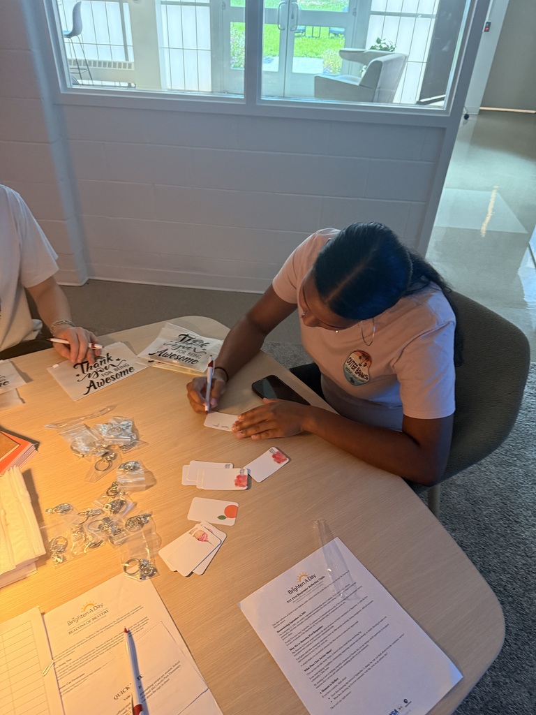 Camryn writes out thank you cards for the bravery kits.