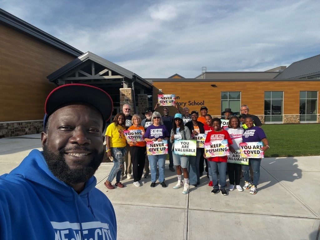 Me We City greeting students at Doe Run Elementary on Friday, October 2, 2026 pic#2