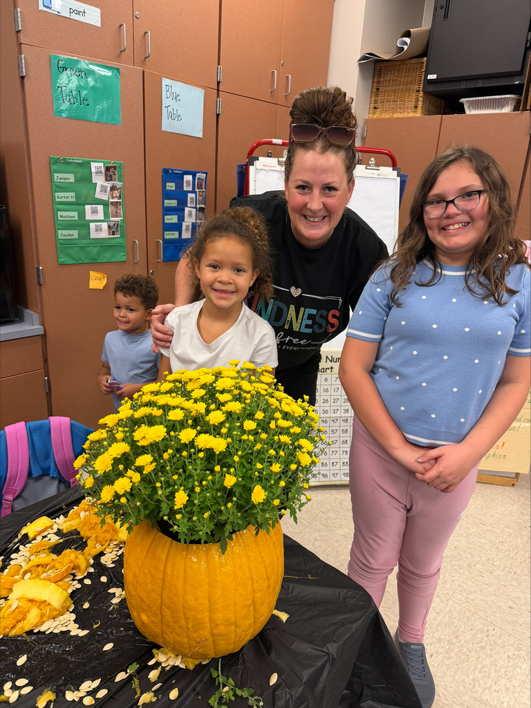 Rainbow Elementary Gardening Club October 2026 meeting making pumpkins into planters for fall mums pic#6