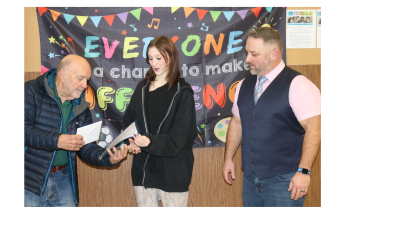 Makenzie Kieger receiving award