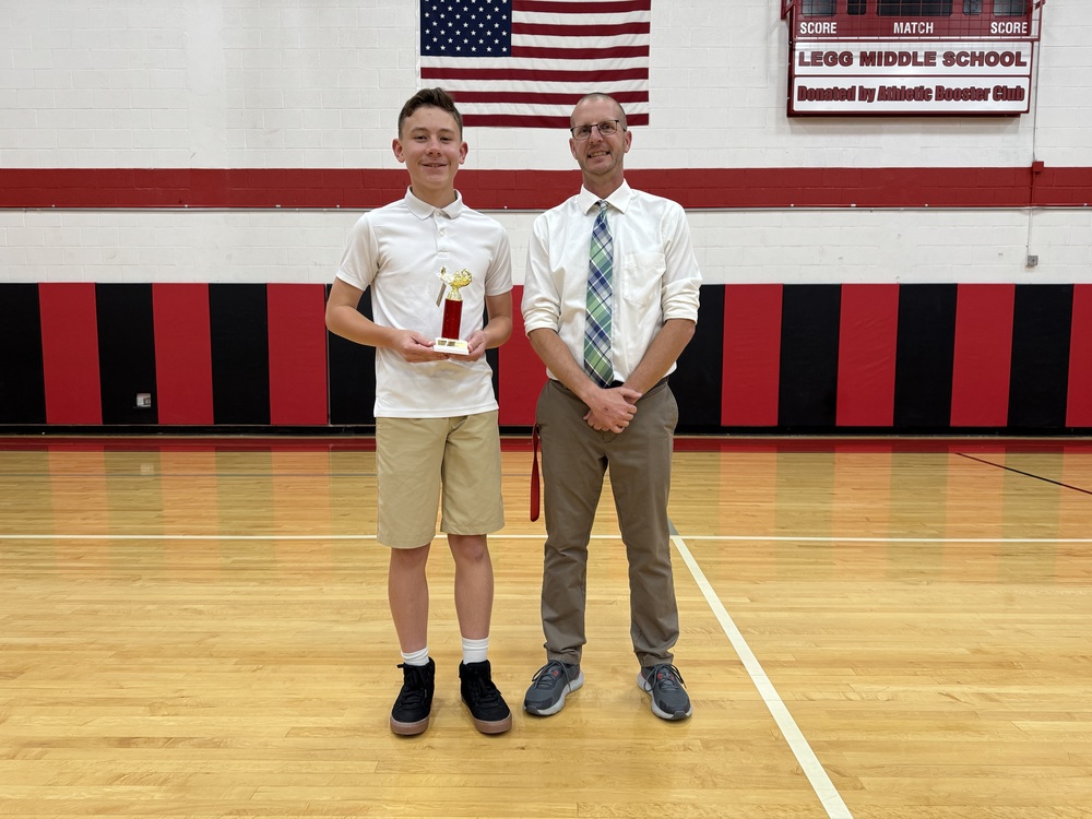 2025 Axner Olson Citizenship Award winner Henry Koyl and LMS teacher Jeff Qualls