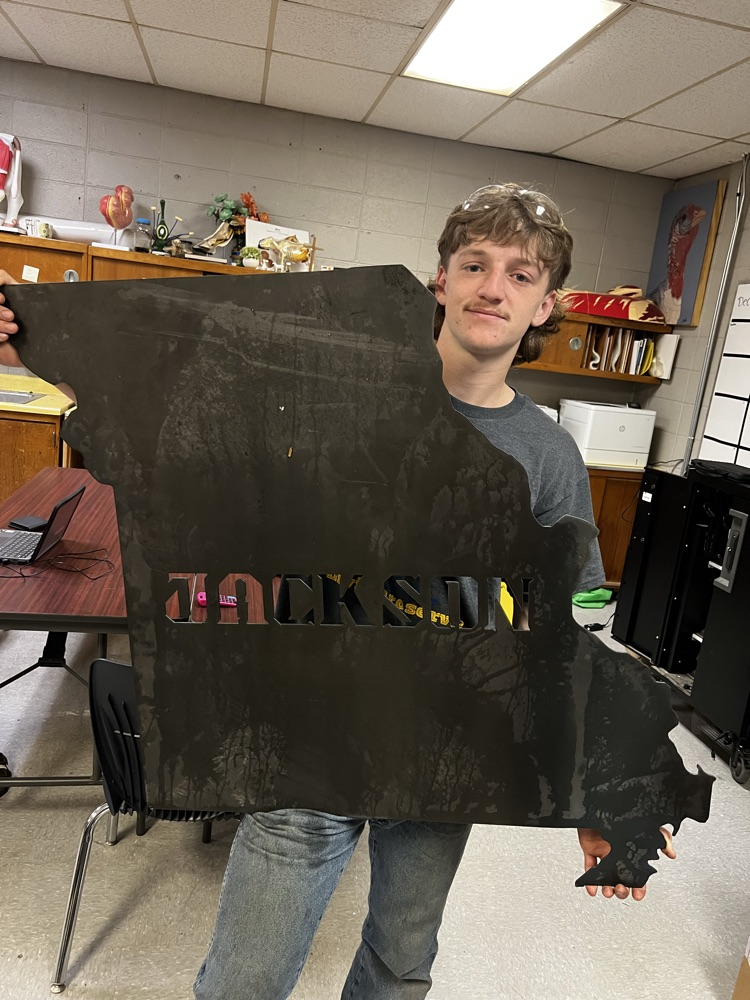 Colton with a community members project 