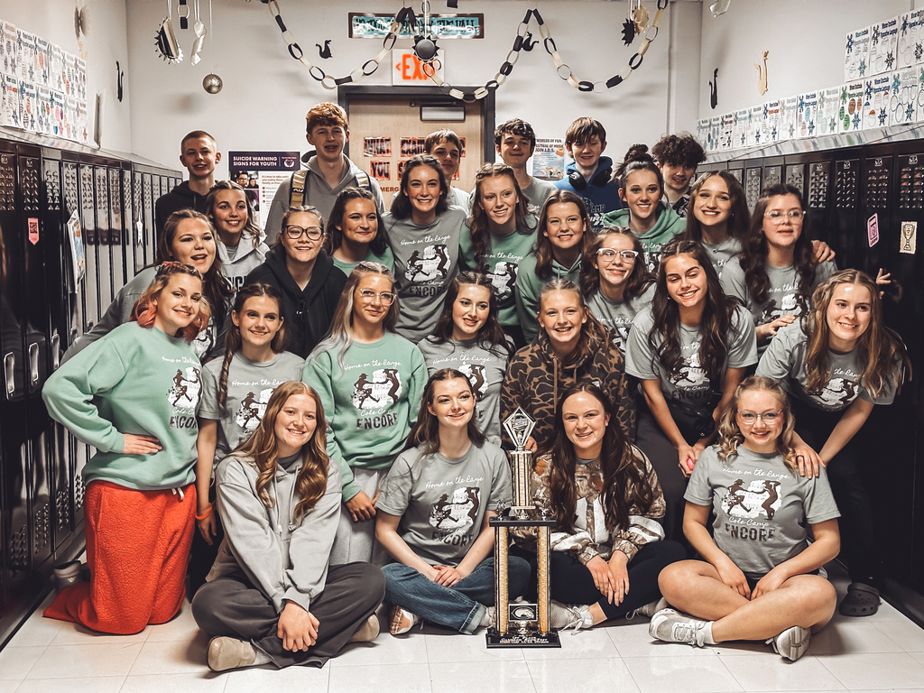 Encore group picture with trohpy.