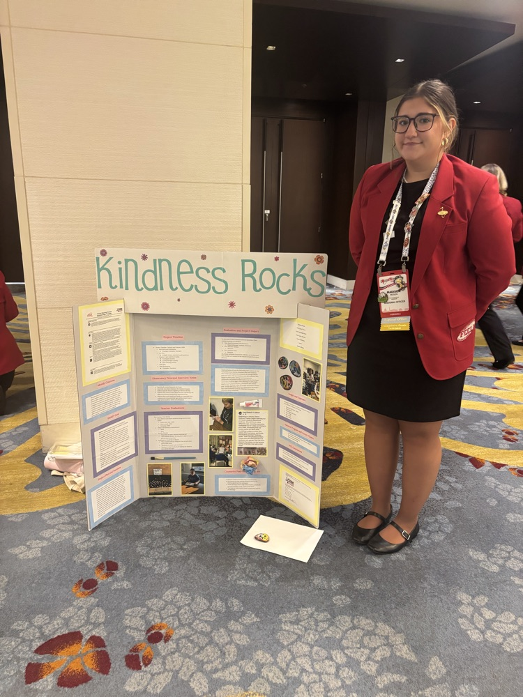 Madison Paxson at FCCLA National STAR Events with her display board