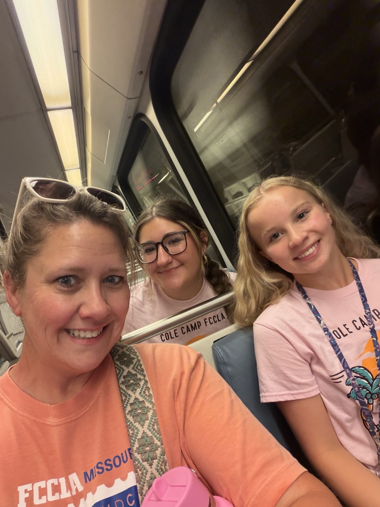 Madison Paxson, and Kaylan Poe with adviser, Shanda Miller on the D.C Metro