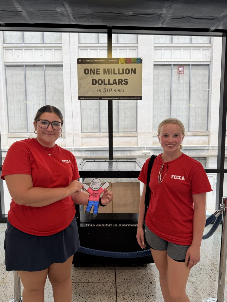 Two students posing at the community National