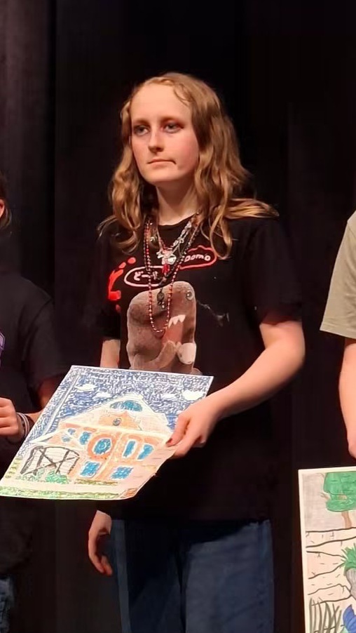 8th grader Tarah Manning received a 3rd place for ink and marker drawing.