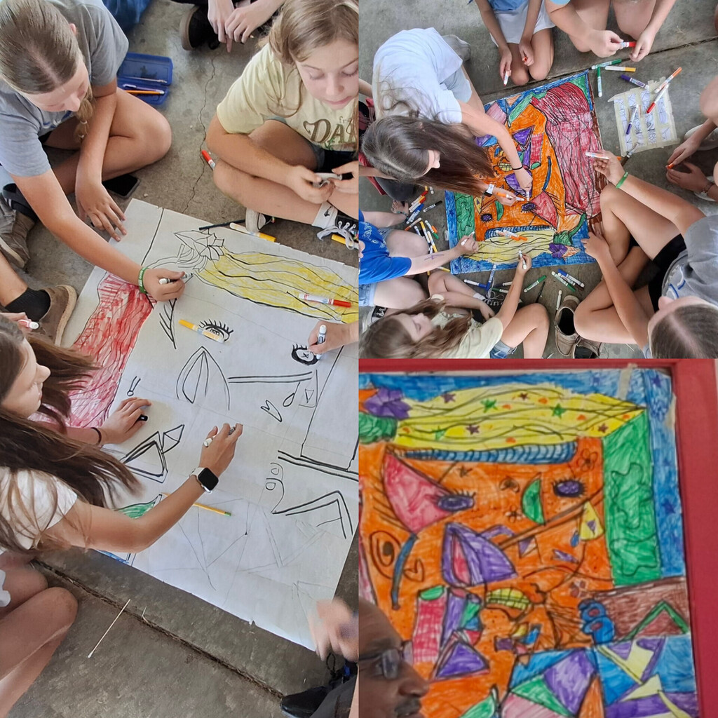 All Cole Camp 6th and 8th grade students work together developing an upscale drawing in marker from a small gridded black and white image by Picasso.
