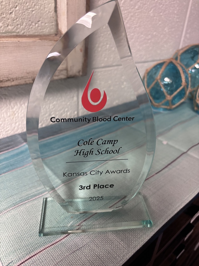 A crystal teardrop trophy from Community Blood Center with Cole Camp High School 3rd Place 2025 written on it