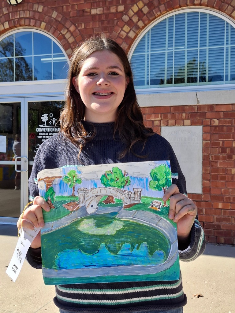 Veda Lutjen with her depiction of the Liberty Park pond in mixed media which received a 3rd place ribbon.