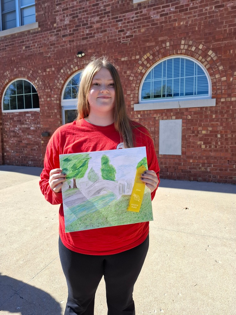 Allyie Martin with her depiction of the bridge over the pond that received a 4th place ribbon.