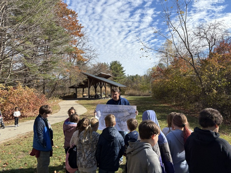 Reading a diagram about what was typically in a canoe