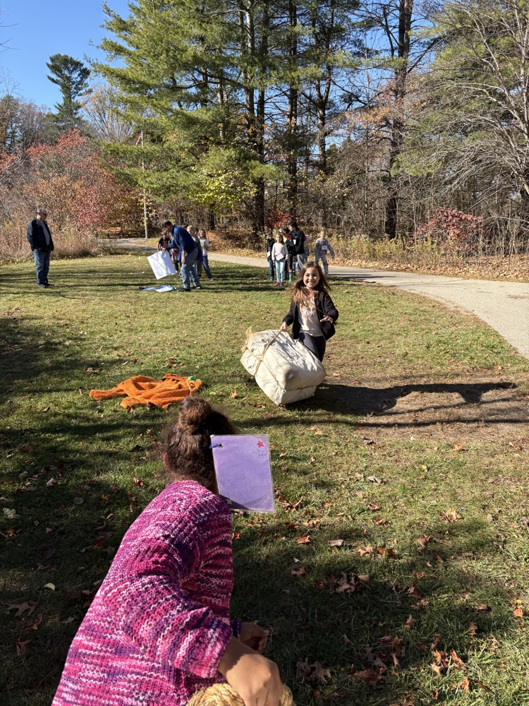 Carrying their goods across land