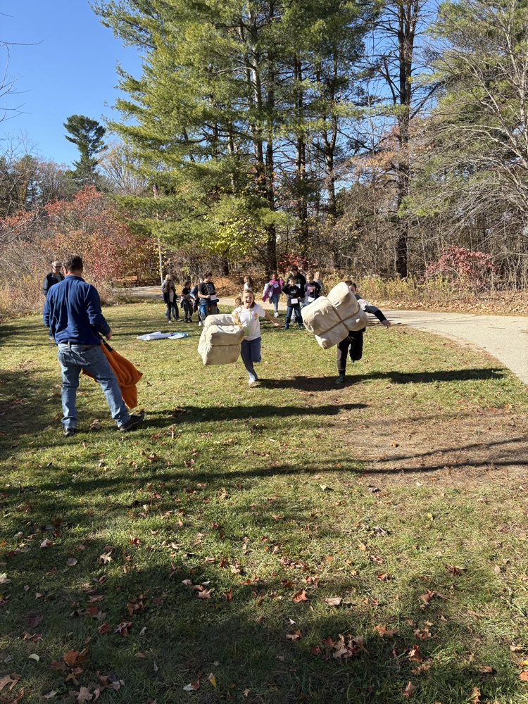 Carrying their goods across land