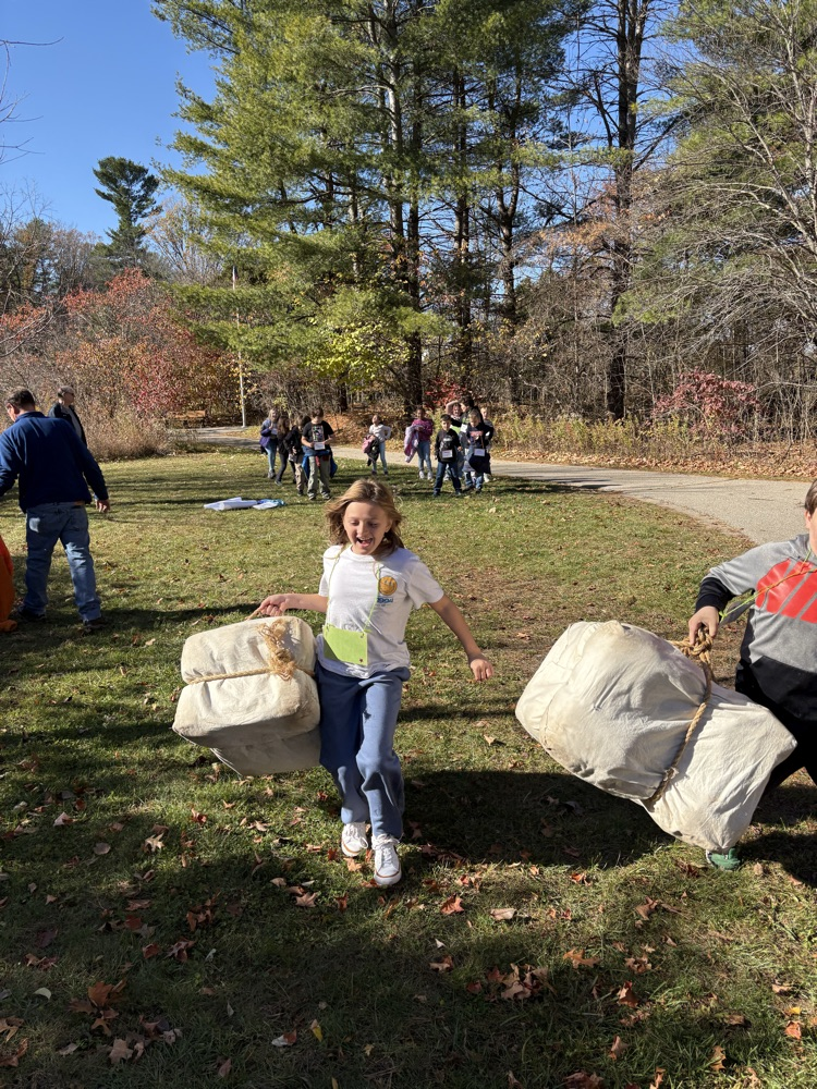 Carrying their goods across land