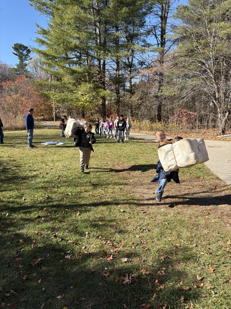 Carrying their goods across land