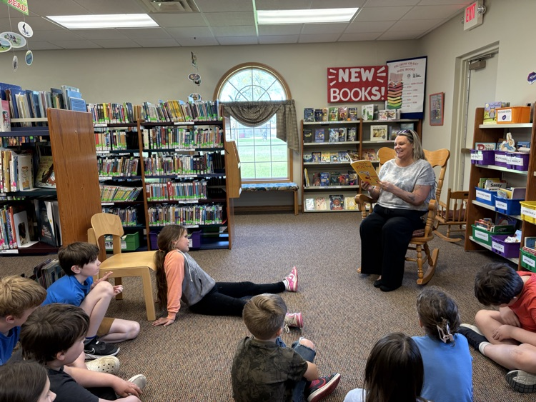 A read aloud of the book “How do you spend?” that students received