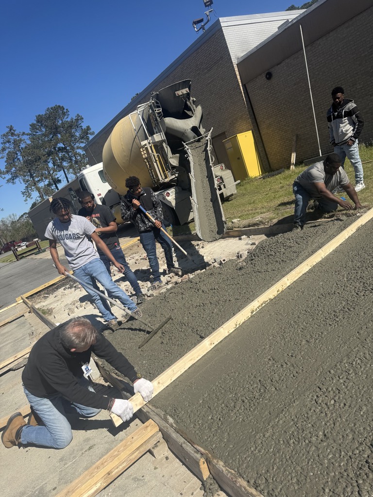 creating cement slabs for our new storage units at TCTC