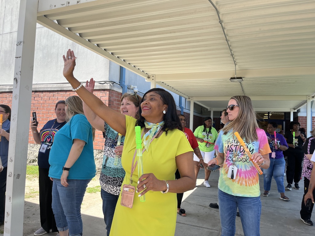 Superintendent Jessica Williams waving good bye