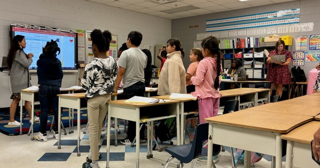Teacher & class of students