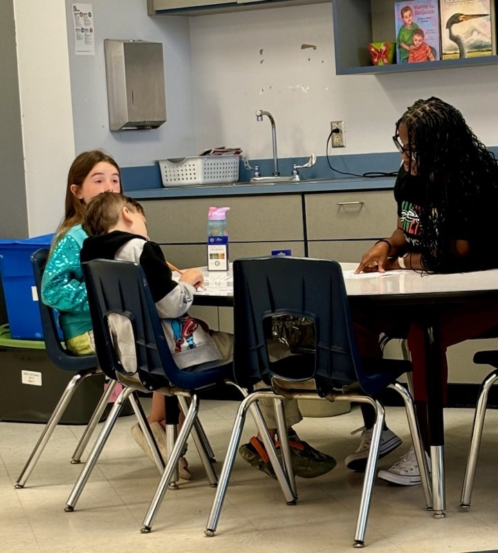 Teacher & 2 students