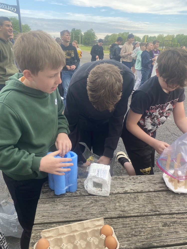 more students with their projects and eggs