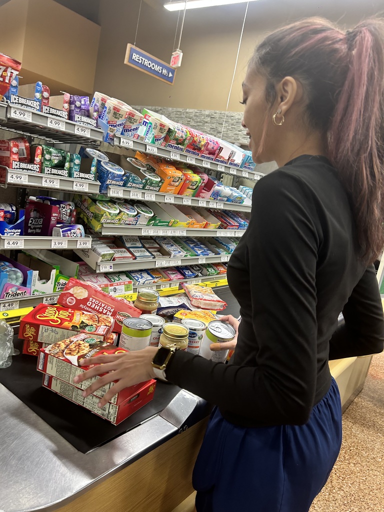 Girl at Grocery Check Out
