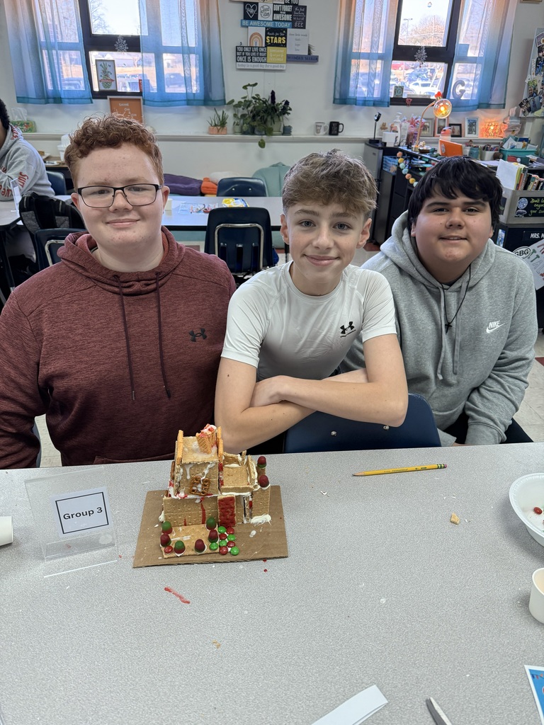 Boys with gingerbread house