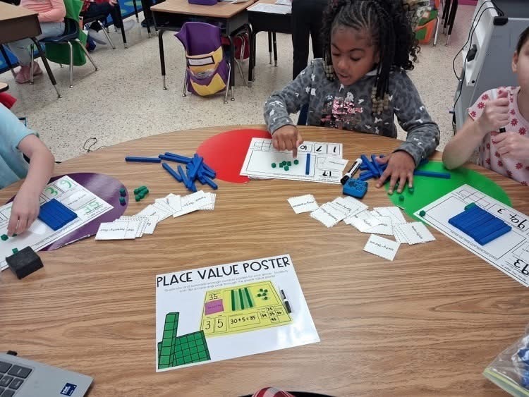 Students working on place value