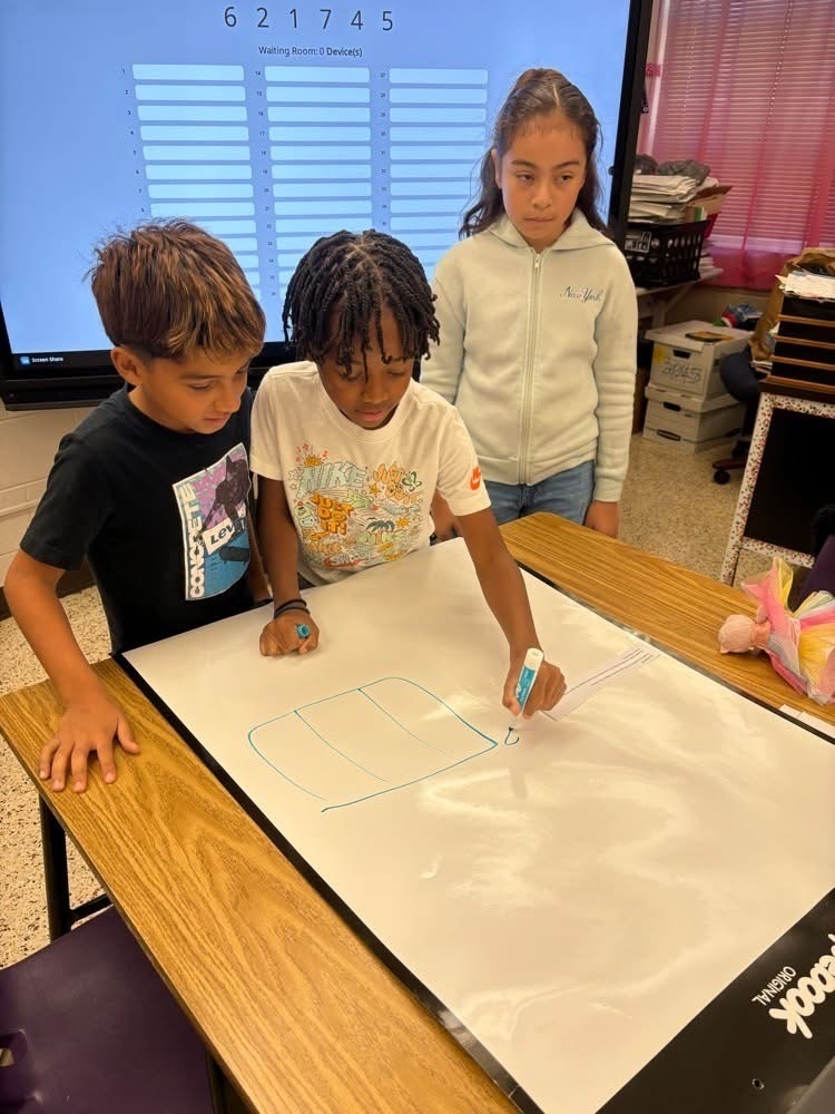 Students problem solving together