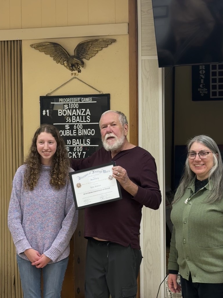 Student winning VFW Award with certificate