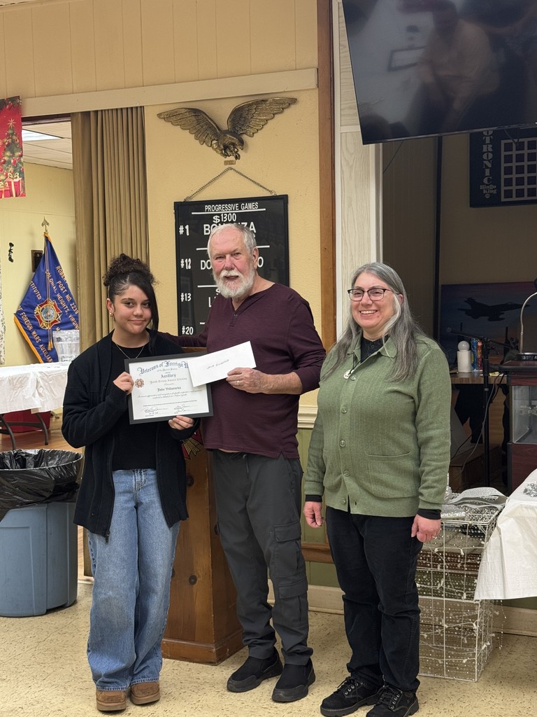Student winning VFW Award with certificate
