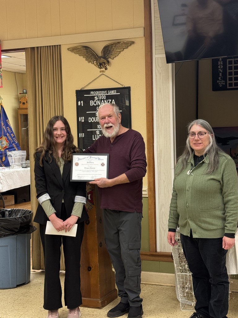 Student winning VFW Award with certificate
