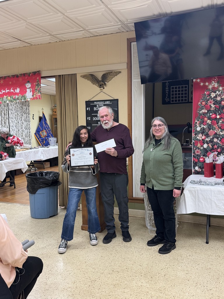 Student winning VFW Award with certificate