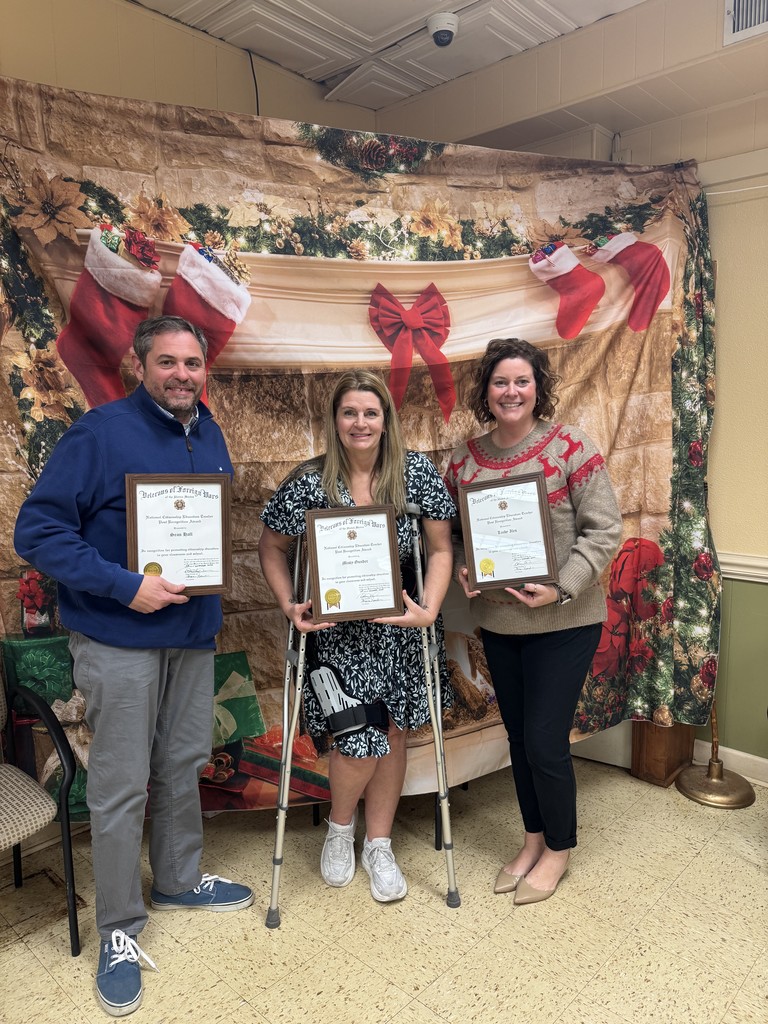 CHPS teachers winning VFW Award with certificates