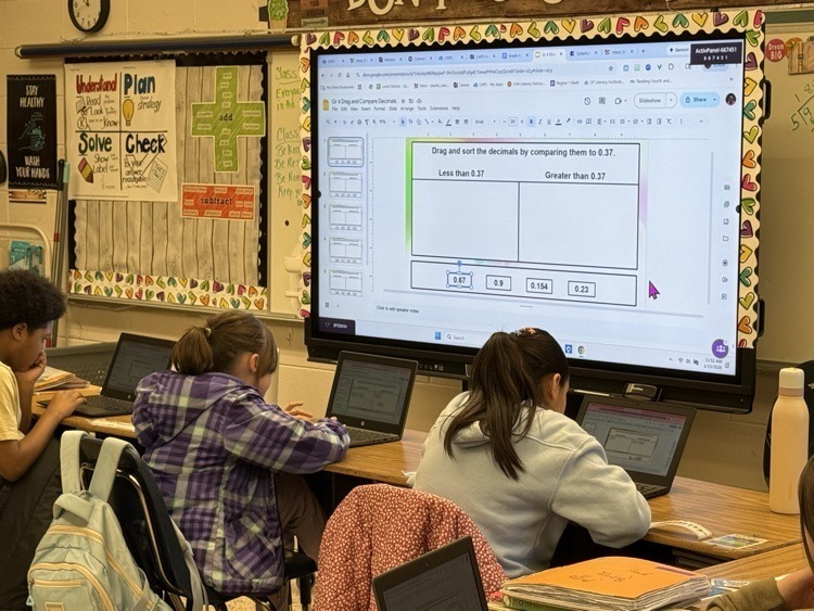 Students on Chromebooks for Decimal Review