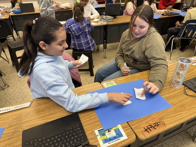 Girls playing Math review game